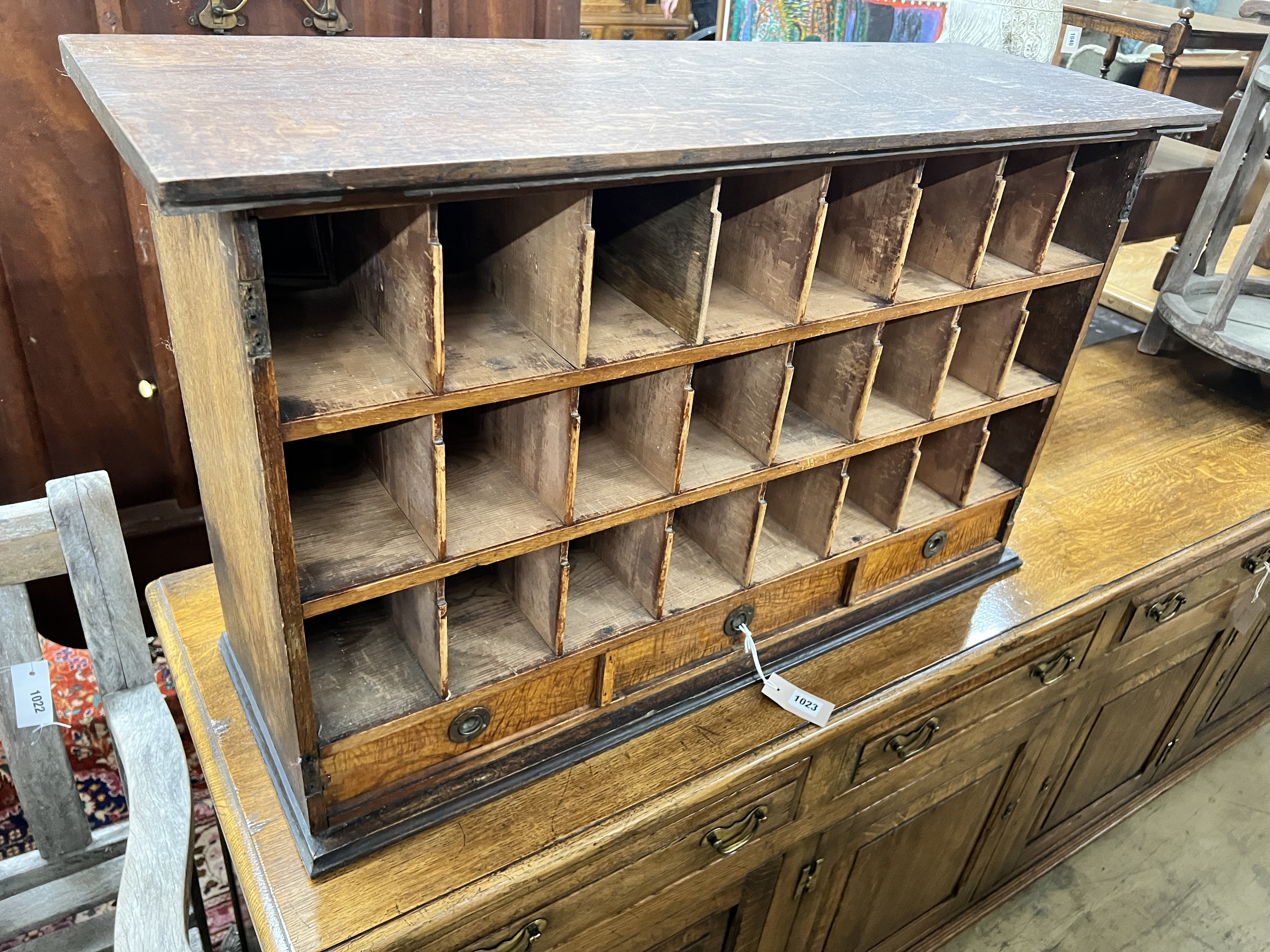 An early 20th century three drawer pigeonhole unit, length 94cm, depth 32cm, height 56cm